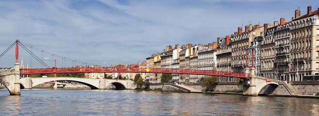 Fototapeta na wymiar Lyon city with red footbridge in summer