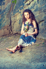 Young American Woman missing you with white rose in New York