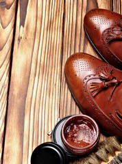 leather shoes brogues loafers with shoe maintenance set.Shoes care.copy space.top view