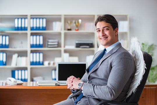 Angel investor concept with businessman and wings
