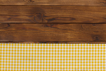 Background with empty wooden table with tablecloth