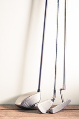 old golf club on old wood table