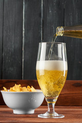 Glass of beer and beer bottle