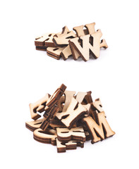 Pile of wood carved letters isolated