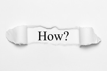 How? on white torn paper
