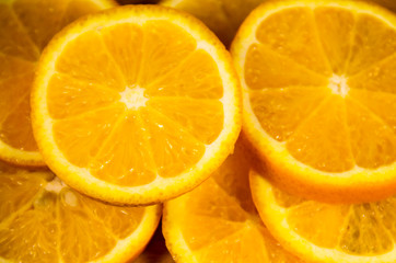 Background of sliced juicy oranges fruit