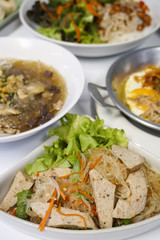 vermicelli and preserved pork sausage spicy salad on white background. Food Thailand. Yam noodles pork sausage