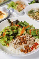 wide rice noodles salad on white background. Food Thailand