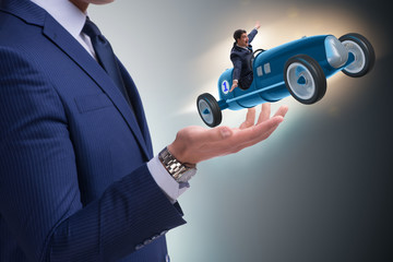 Man launching race car in start concept