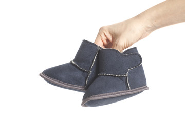 children winter boots on hands