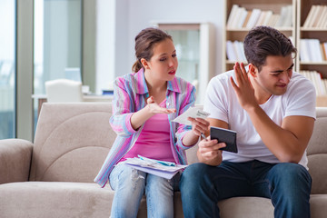 Young family discussing family finances