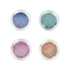 Round box of sequin bits isolated