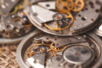Clockwork old mechanical USSR watch. close up, macro shot.