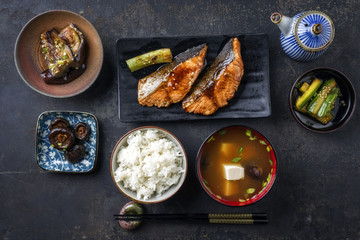 Traditional Japanese dish with Fish Teriyaki and Soup as close-up in bowls