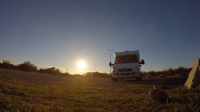 Time lapse of a sunset in camper park on the beach in narbonne, france