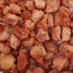 Surface covered with bacon bits