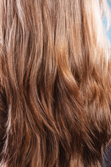 Natural brown hair closeup background