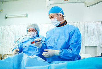 Interventional cardiology. Male surgeon doctor at operation