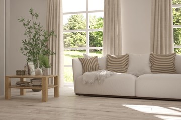White room with sofa and green landscape in window. Scandinavian interior design. 3D illustration