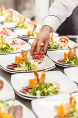 Cook prepare appetizer dishes