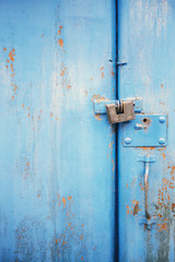The old door locked with a padlock hanging brackets. Set of backgrounds