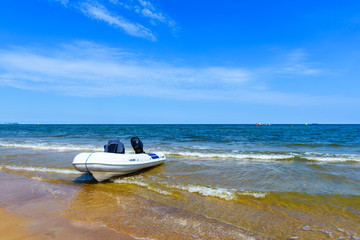 Motorboat mooring on the shore of Baltic Sea. Sopot, Poland.