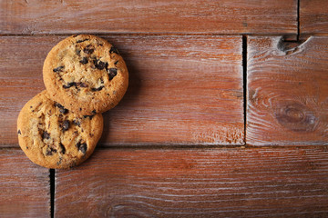 Chocolate chip cookies on brown wooden table