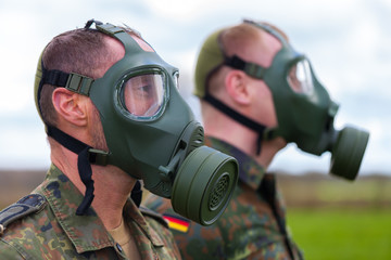 two german soldiers with abc mask