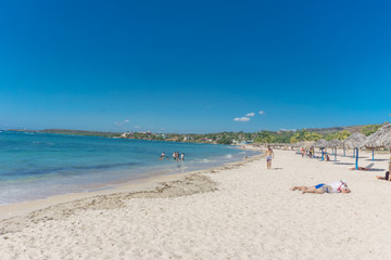 Cienfuegos, Cuba – January 1, 2017: Caribbean beach Playa Rancho Luna in Cienfuegos. Sandy coast