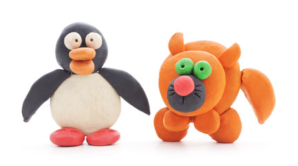 Plasticine cat and penguin.