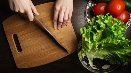 Tomato slice on wooden board, food cooking