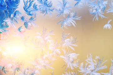 Fototapeta na wymiar Frosty patterns on glass. Winter background.