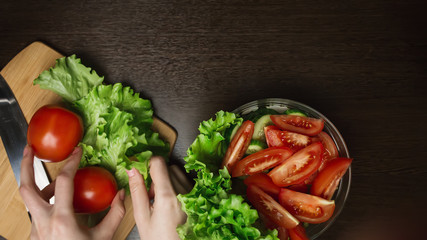Tomato slice on wooden board, food cooking