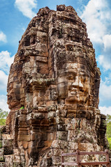 Obraz premium Stone faces of the famous Bayon temple in Angkor Thom complex, Siem Reap, Cambodia.