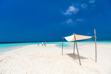 Mother and kids at tropical beach