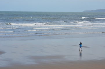 Lonely woman on the beach