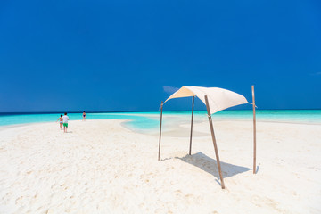 Mother and kids at tropical beach