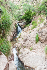 Fototapeta premium Waterfall in Quebrada del Colorado canyon near Cafayate, Argentina
