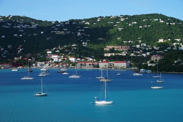 Obraz premium View of Long Bay, St. Thomas island, US Virgin Islands from water with multiple yachts and boats on the foreground