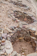Remnants of tombs at pre-Columbian fortification Pucara near Tilcara village in Quebrada de Humahuaca valley, Argentina
