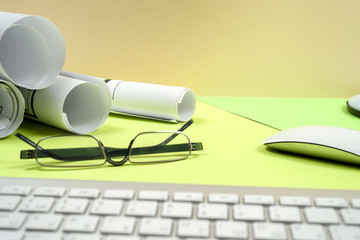 Workplace of architect - rolls and plans.