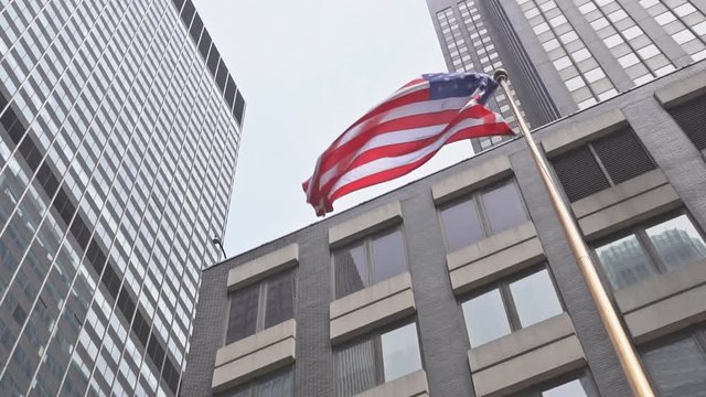 American flag against bright blue sky