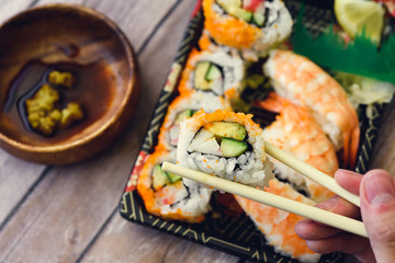 Sushi in Box with Chopsticks and Mustard