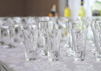 Many empty glasses. The concept of the restaurant, dishes and celebration.
