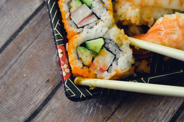 Sushi in Box with Chopsticks