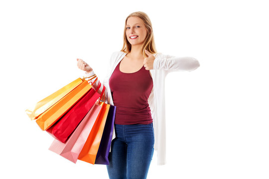 Beauty hhopping woman holding bags
