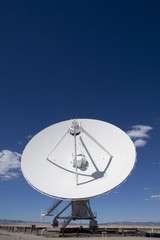 Radio telescope dish pointed up at the sky