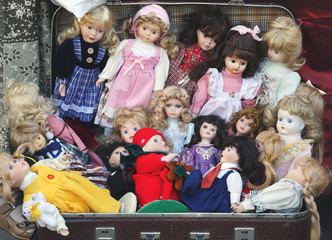 Sale vintage dolls at a flea market. Collecting vintage things.