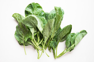 Fresh chinese kale on white background ready to cooking,organic vegetable