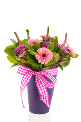 Mixed bouquet flowers in blue vase